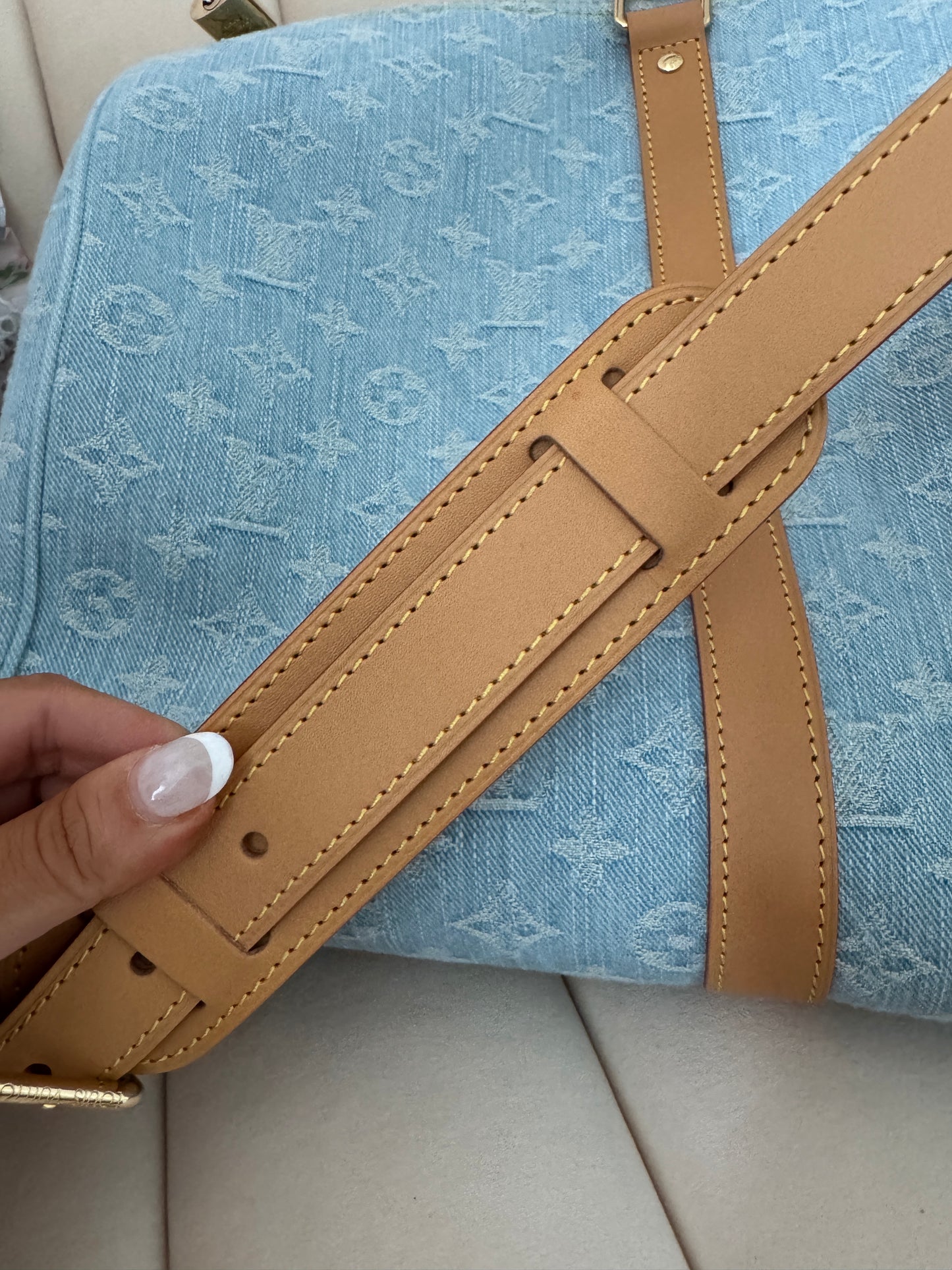 LV denim duffle bag