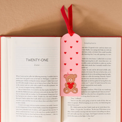 Cute pink bookmark with teddy bear and hearts, perfect for book lovers and gifts.